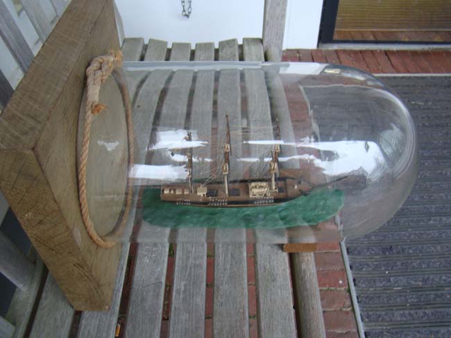 A three-masted ship in a glass dome circa 1960 — image 3